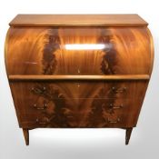 A reproduction flame mahogany veneered cylinder bureau, 89 cm x 50 cm x 96 cm.