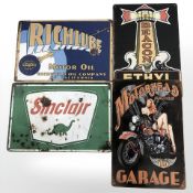 Four reproduction tin motoring signs, largest 30 cm long.