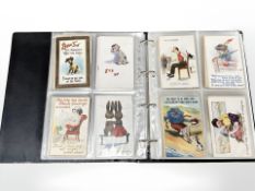 An album containing approximately 240 postcards, antique and later examples including Louis Wain,