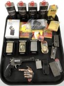 A group of Zippo lighters, novelty lighters, tins of fluid, etc.