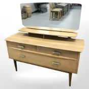 A Lebus oak mirror backed dressing chest,
