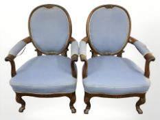 A pair of early 20th century mahogany salon armchairs, width 70 cm.