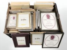 A large quantity of new photograph frames in rustic, silvered and gilt finishes.
