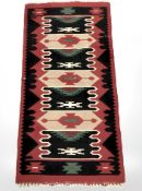 An Eastern flat weave kilim 123 cm x 60 cm