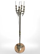 A Continental cast brass standard lamp (continental plug)