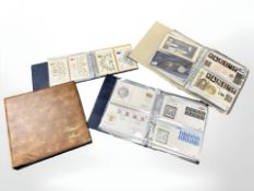 Three albums containing First Day Covers, Royal Mint coin covers,