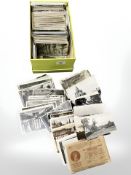 A shoebox containing in excess of 500 various postcards.