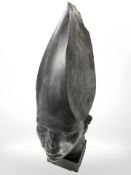 A resin Egyptian bust, height 51 cm.
