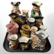 A collection of Toby and character jugs.