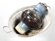 A galvanised twin handled tub, width 61 cm, and a lantern.