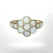 A 9ct yellow gold opal cluster ring, size O. CONDITION REPORT: 2.8g.