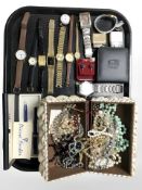 A shell-mounted jewellery box containing assorted bead necklaces,