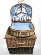 Three wicker hampers.