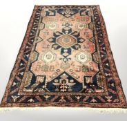 A Hamadan rug, North-West Iran, 210 cm x 130 cm.