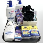 A group of cosmetics and healthcare products including Head and Shoulders, Dove, Nivea,