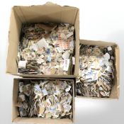 Several thousand loose 20th century stamps.