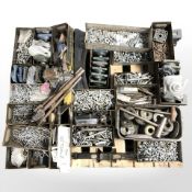 A large quantity of screws, nuts, bolts, brass blow lamp, ratchet straps and similar hardware.