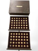 An Our Royal Sovereigns coin collection comprising of seventy-gold plated coins depicting British