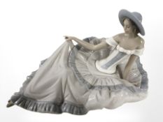 A large Nao figure of a lady in flowing dress, height 18 cm.