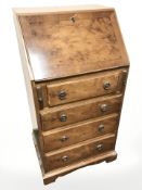 A yew wood lady's fall front writing bureau, 51 cm x 42 cm x 99 cm.