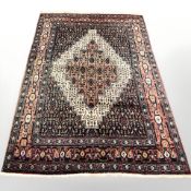 A Tabriz rug, North-West Iran, 197 cm x 127 cm.