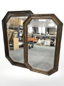 Two Edwardian octagonal oak framed mirrors, largest 85 cm x 58 cm,