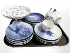 A group of Bing & Grondahl blue and white collectors plates, Royal Copenhagen tea pot,