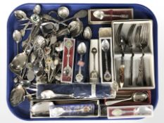 Assorted collectors spoons and other cutlery.