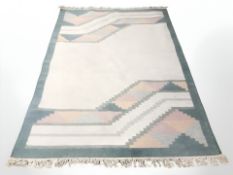 A 20th century flatweave geometric rug, 250 cm x 170 cm.
