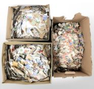 Several thousand loose 20th century stamps.