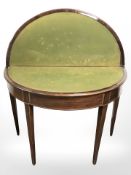 A Victorian mahogany turnover top card table,