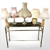 A brass and smoked glass side table,