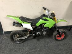 A child's petrol motorbike (crack to bodywork).