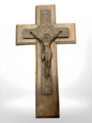 A French patinated bronze and walnut crucifix, circa 1900, initialed G D, length 40 cm.