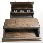 Two late 19th century oak desk stands.