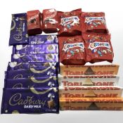 Eighteen various packets of chocolate confectionary including Cadbury's, Lindor, Toblerone, etc.