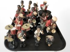 A group of resin jazz band figurines.