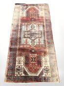 A Hamadan rug, North-West Iran, 210 cm x 102 cm.
