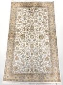 An Indian/Pakistani rug of Isfahan design, 160 cm x 94 cm.