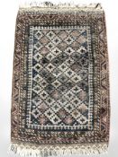 A small Balouch rug, Afghanistan, 92 cm x 56 cm.