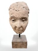 Thisa Hess : Terracotta mask study on square plinth base, signed, height 29 cm.