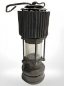 A Patterson Lamps Felling on Tyne Type HCP miner's safety lamp.