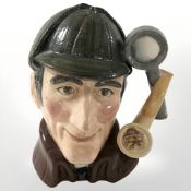 A Royal Doulton character jug 'The Sleuth'.