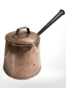 A 19th century copper milk / saucepan with lid and cast iron handle, length 27 cm.