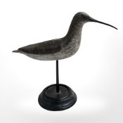 A decoy shore bird on stand, height 21 cm.