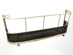 A Victorian brass and steel fire guard, width 124 cm.