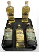 Five bottles of Filippo Berio olive oil.