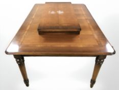 A reproduction yew wood extending dining table with leaf, total length 215 cm x 112 cm x 77 cm,