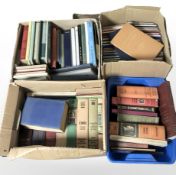 A collection of volumes relating to stamps, including Stanley Gibbons catalogues, etc.