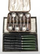 A boxed set of six EPNS coffee spoons and further boxed set of six butter knives